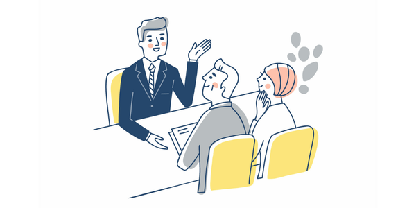 テーブルを挟んで親身に相談に乗っている打ち合わせのイラスト(伴走型サポートのイメージ)